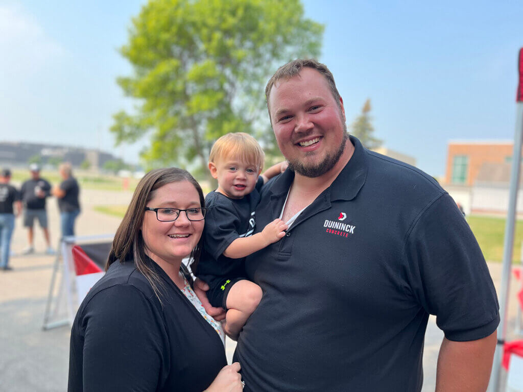 Duininck Concrete employee with his wife and child