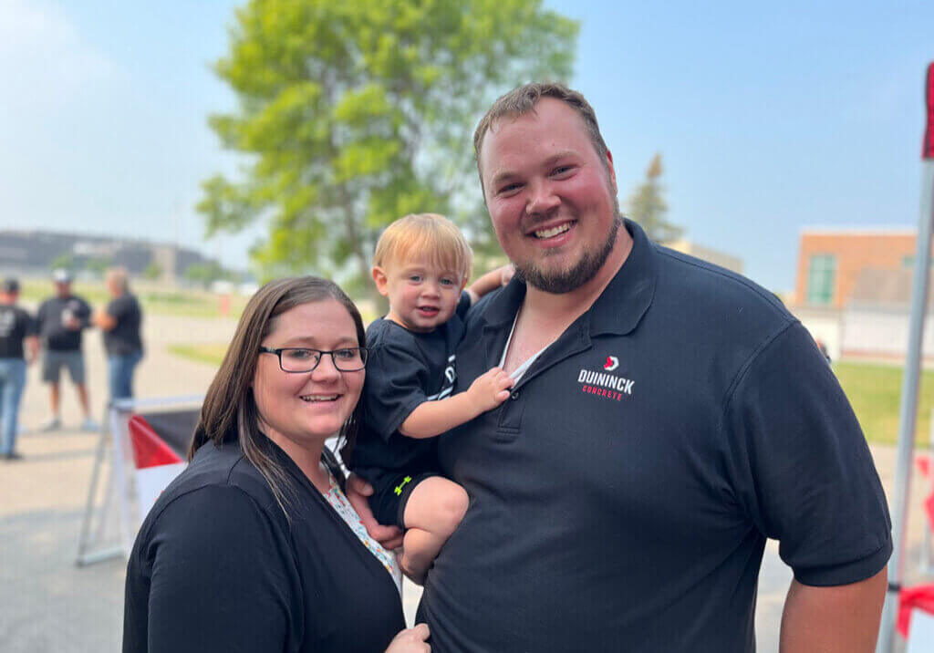 Duininck Concrete employee with his wife and child